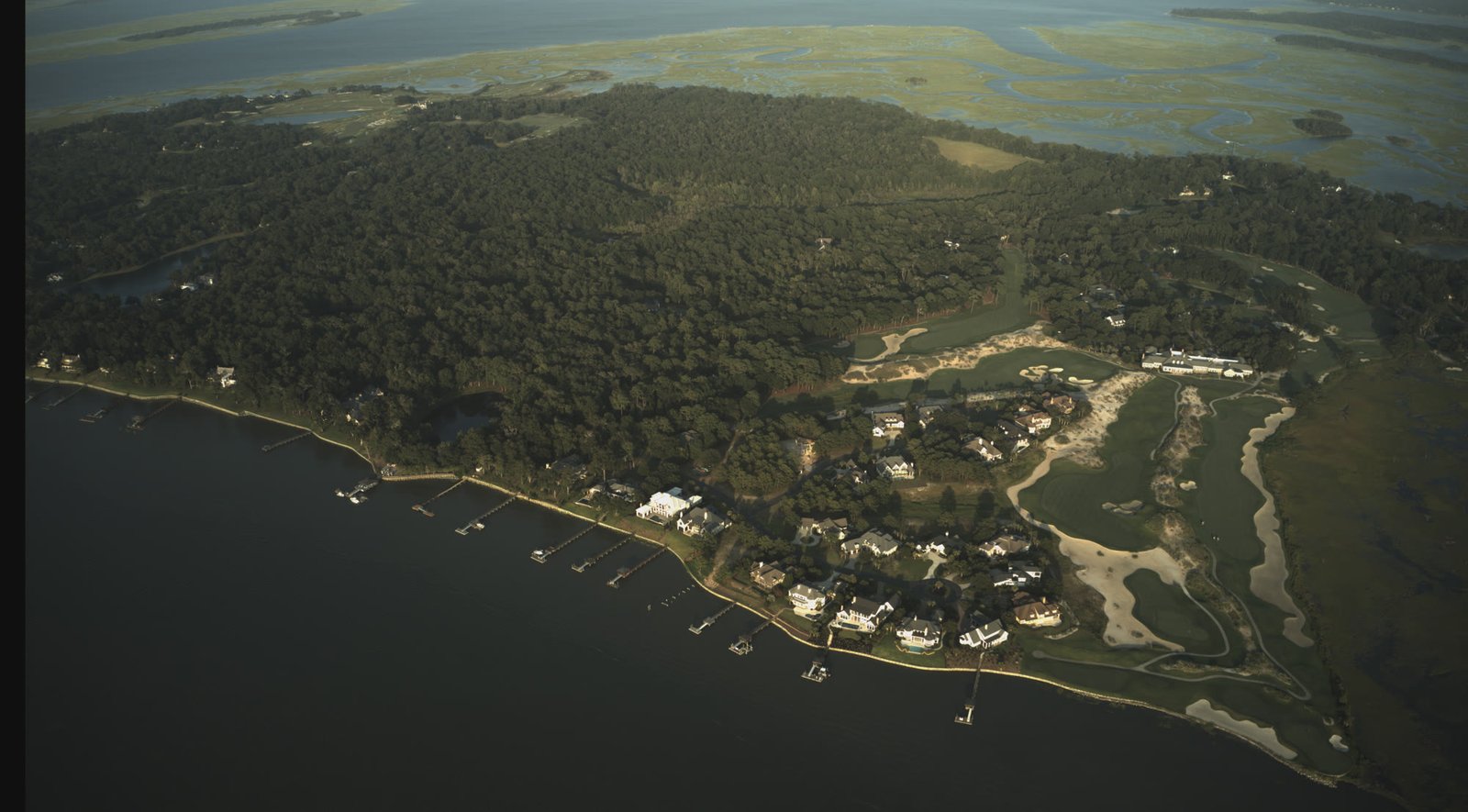 Aerial view of a Lowcountry waterfront neighborhood and marsh in Beaufort County, South Carolina